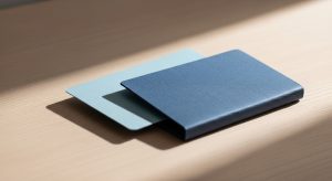 A blue wallet with a light blue card.